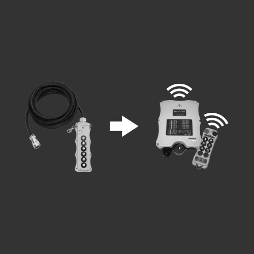 black and white image of crane operator remotes - Aero Material Handling Inc